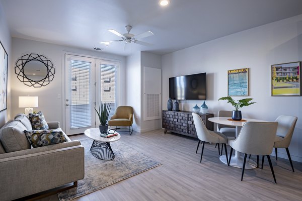 Spacious kitchen with stainless steel appliances in FLATZ 432 Apartments