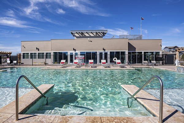 Rooftop pool with skyline views at FLATZ 432 Apartments