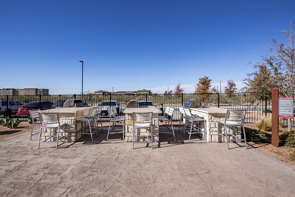 Courtyard with lush landscaping at FLATZ 432 Apartments, offering outdoor seating and relaxation spaces in luxury setting