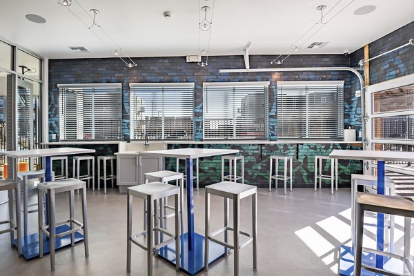 Outdoor patio with modern seating at FLATZ 432 Apartments