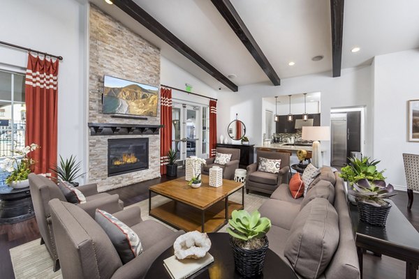 Clubhouse featuring modern amenities at Viano at Riverwalk Apartments