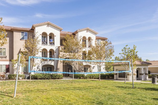 Outdoor sport court at Viano at Riverwalk Apartments, ideal for basketball and tennis enthusiasts