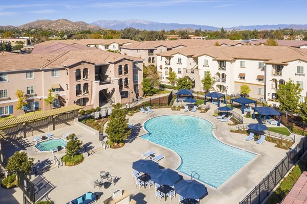 Scenic view at Viano at Riverwalk Apartments with lush greenery and modern architecture