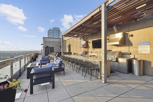 Vela on The Park: Outdoor grill area on a spacious patio at luxury apartments in Stamford Ideal for social gatherings and relaxation