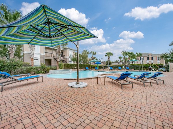 Resort-style pool with sundeck at Westmount at Mason Creek Apartments