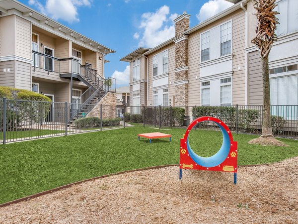 Outdoor recreation area with tennis courts at Westmount at Mason Creek Apartments