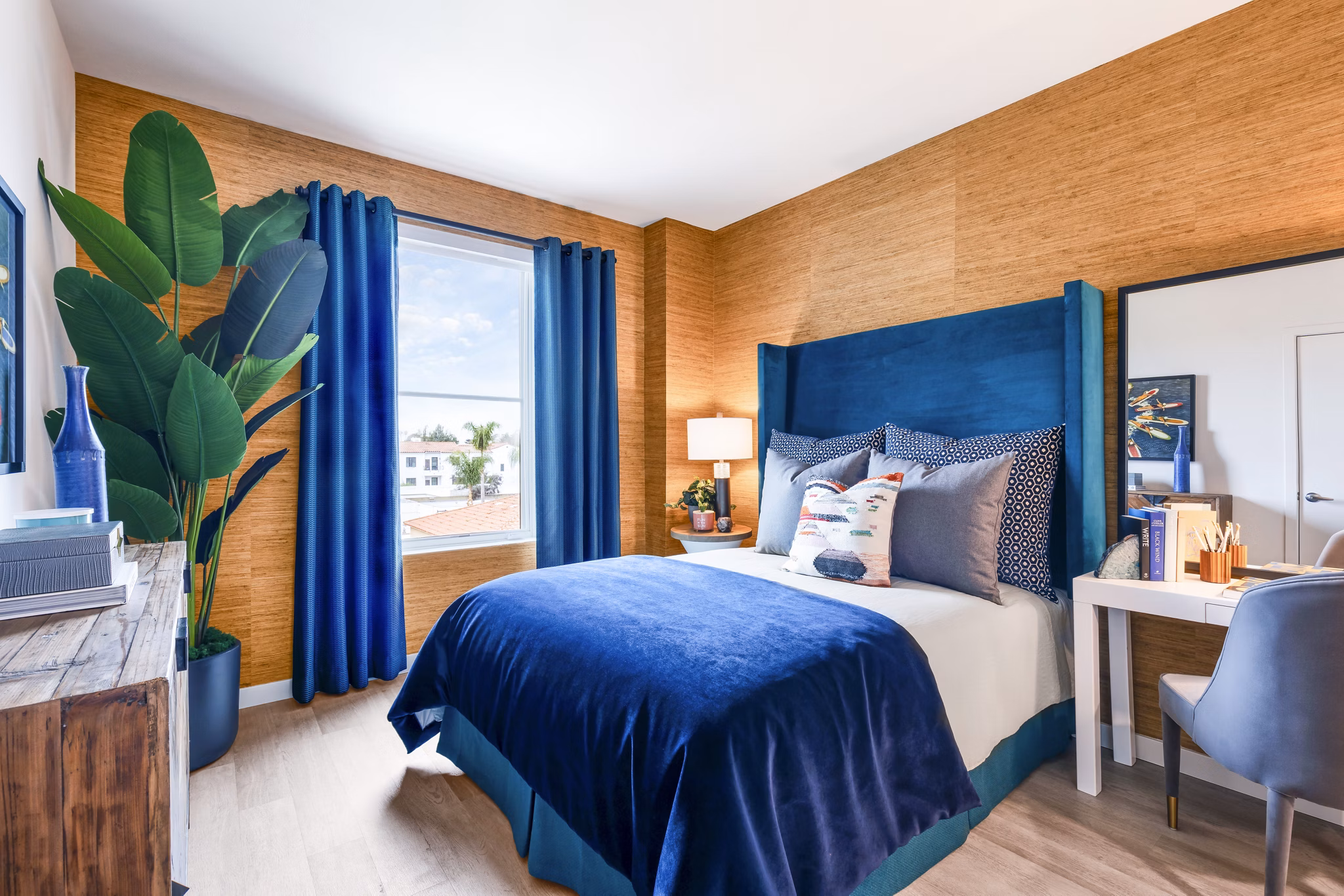 Spacious bedroom with modern decor at Cora Apartments, luxury living offered by Greystar