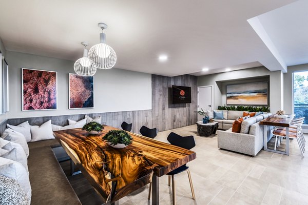 Clubhouse featuring modern amenities at Cora Apartments, a luxury Greystar property