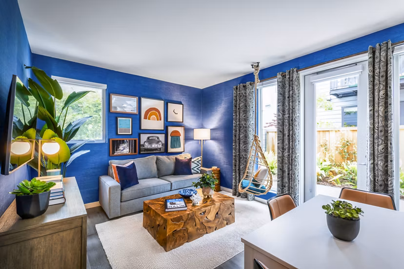Modern living room with stylish furnishings at Cora Apartments, a luxury property in Greystar's upscale community portfolio