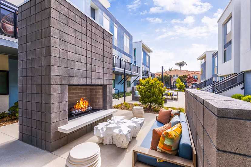 Fire pit on communal patio at Cora Apartments, a Greystar luxury apartment community