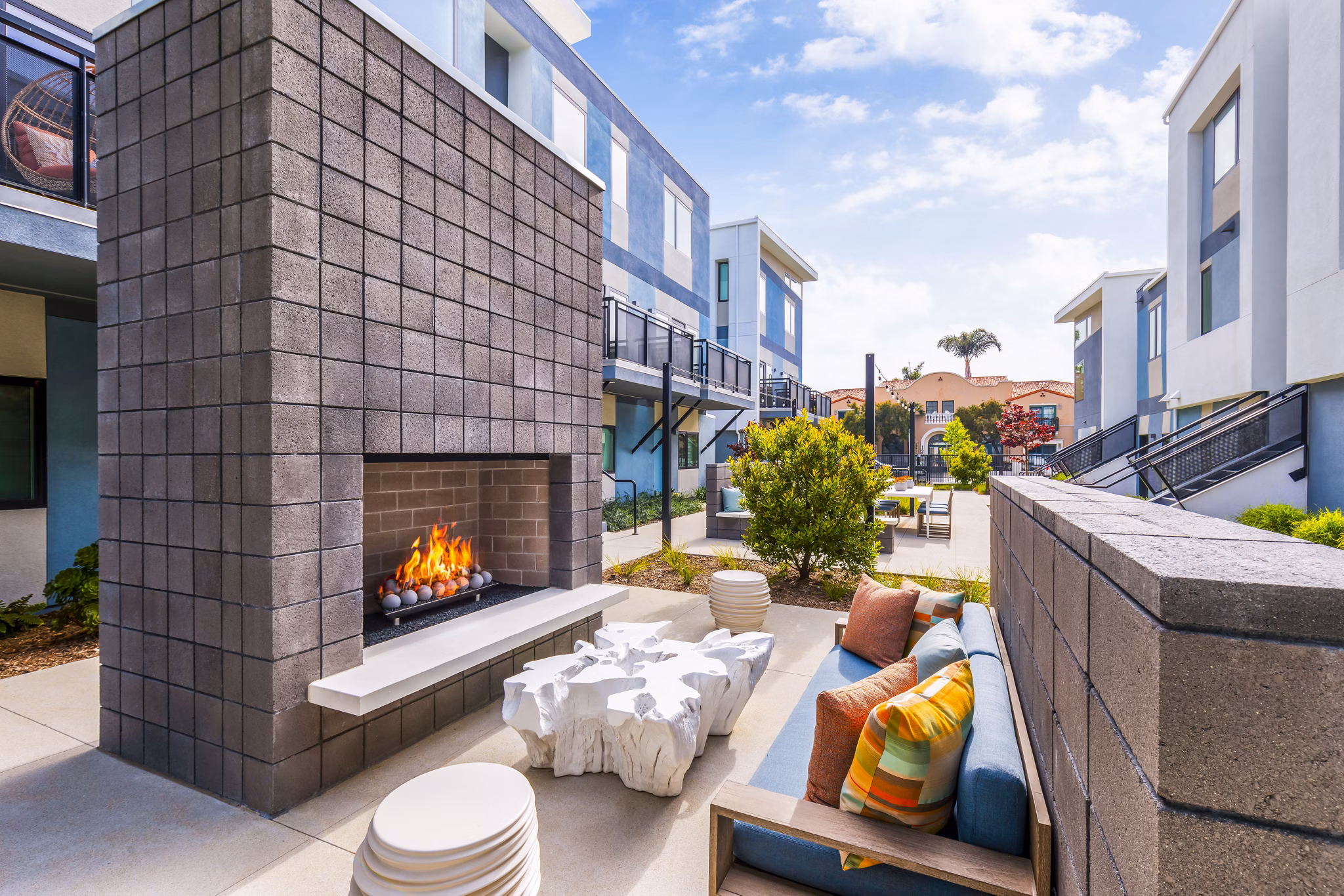 Fire pit on communal patio at Cora Apartments, a Greystar luxury apartment community