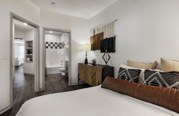 Spacious bedroom with modern decor at Muse at SoCo Apartments