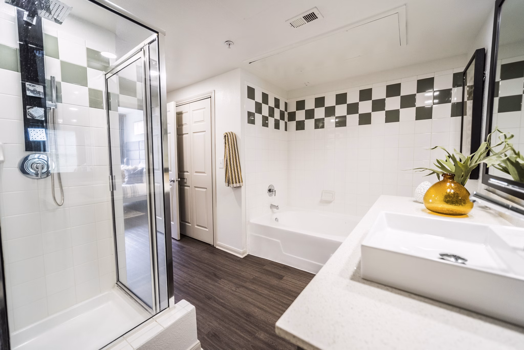 Modern bathroom with sleek fixtures at Muse at SoCo Apartments, offering luxury living in the heart of the community