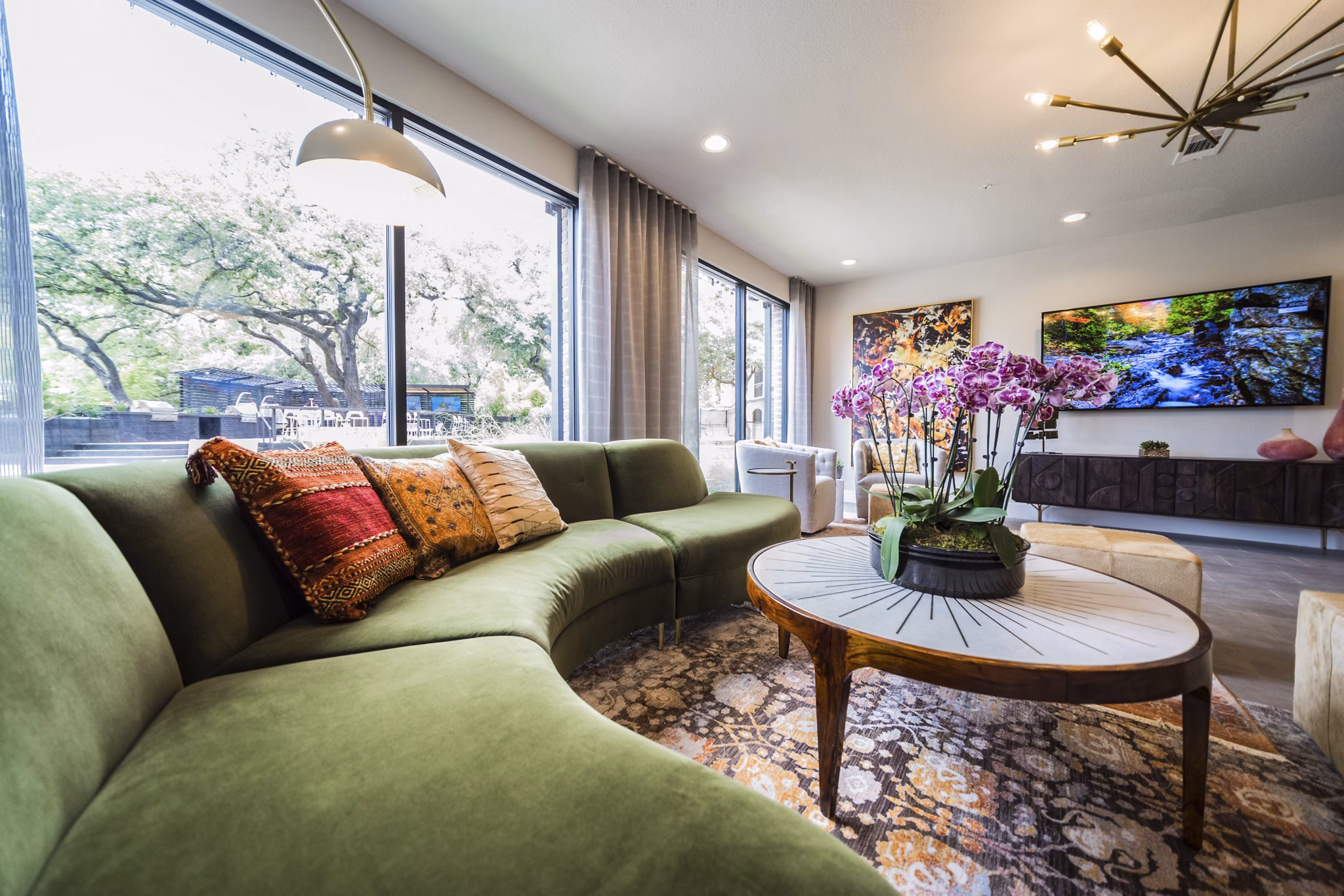 Clubhouse featuring modern design and social lounge in Muse at SoCo Apartments