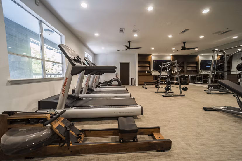 State-of-the-art fitness center with modern equipment at Muse at SoCo Apartments