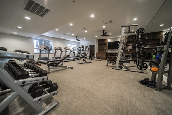 State-of-the-art fitness center featuring modern equipment at Muse at SoCo Apartments in Austin