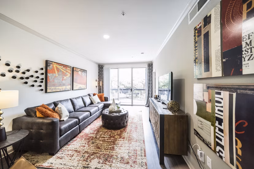 Modern living room with stylish dÃ©cor at Muse at SoCo Apartments