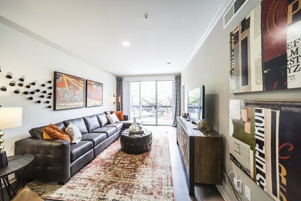 Modern living room with stylish dÃ©cor at Muse at SoCo Apartments