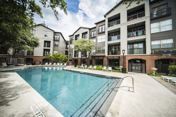Luxury pool with cabanas at Muse at SoCo Apartments, an upscale Greystar community offering resort-style amenities in vibrant Austin