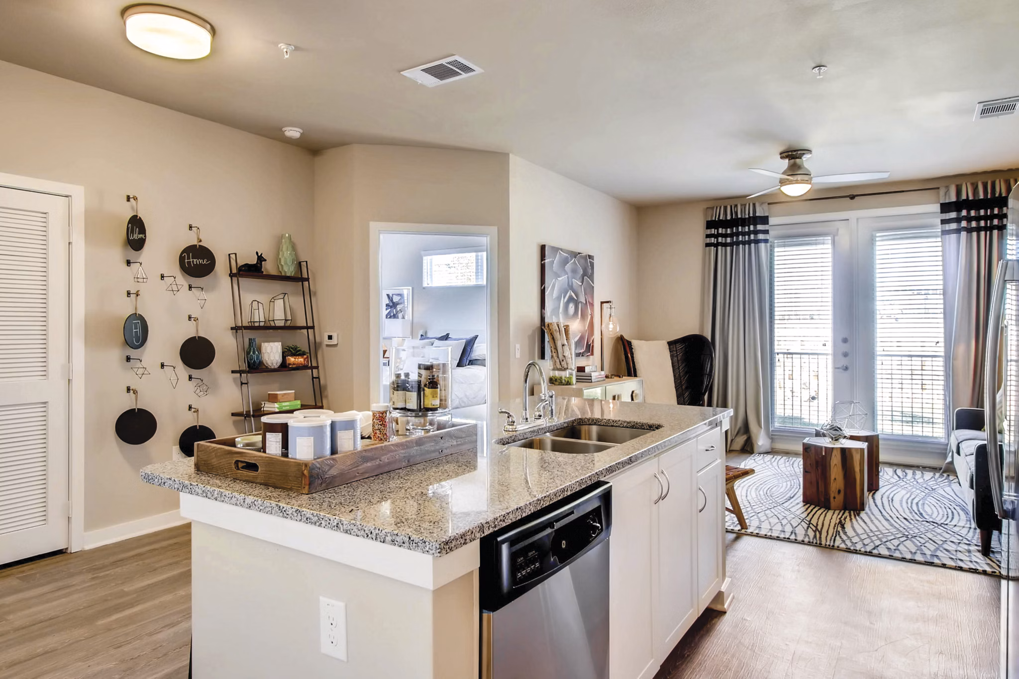 Modern kitchen with stainless steel appliances in Hays Park Apartments, luxury living by Greystar