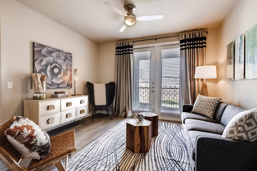 Spacious living room with modern furnishings at Hays Park Apartments