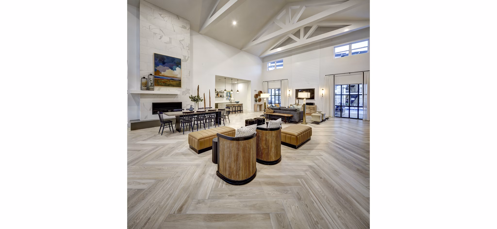 Modern clubhouse with pool tables and seating areas at Leander Park Apartments