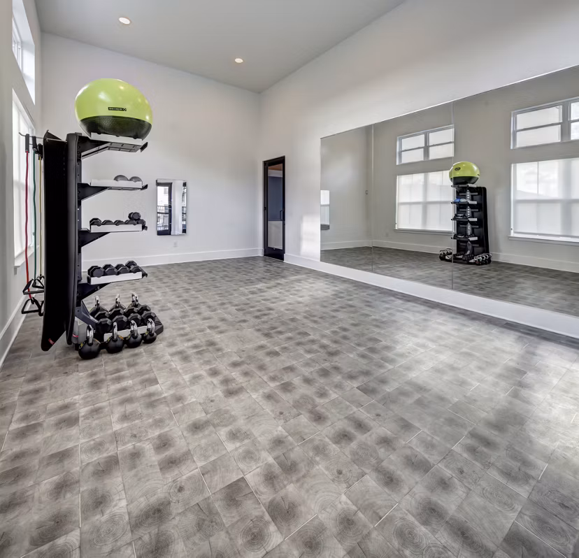 State-of-the-art fitness center with modern equipment at Leander Park Apartments