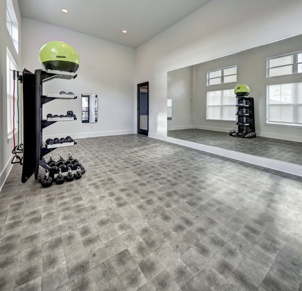 State-of-the-art fitness center with modern equipment at Leander Park Apartments