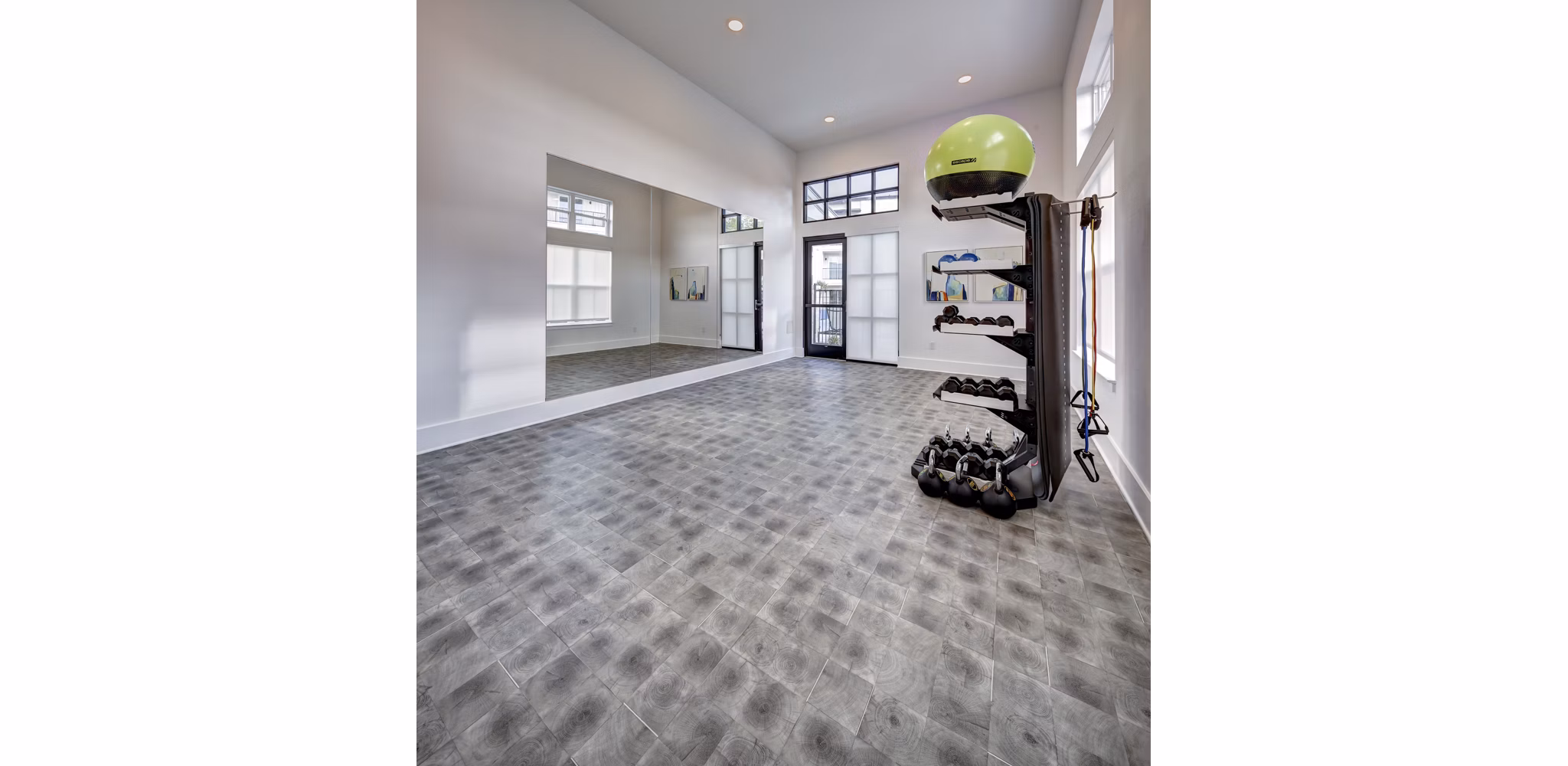 State-of-the-art fitness center equipped with modern machines at Leander Park Apartments, ideal for resident workouts and wellness