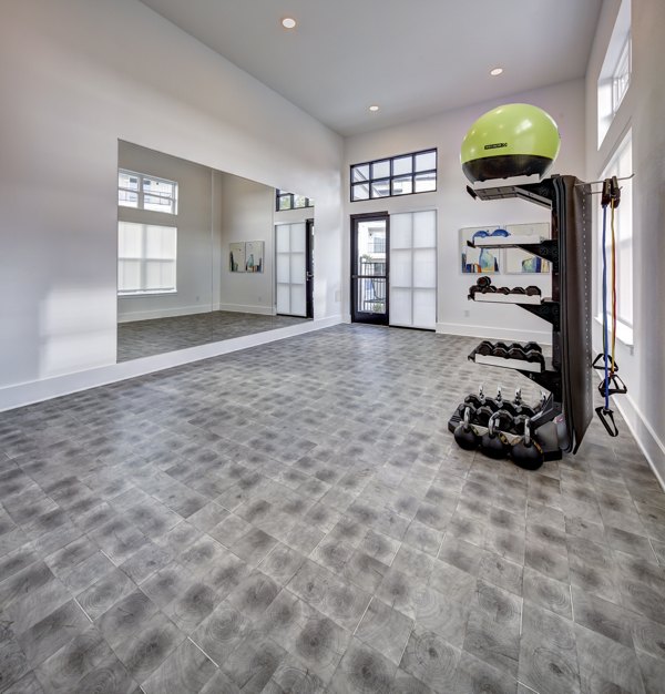 State-of-the-art fitness center equipped with modern machines at Leander Park Apartments, ideal for resident workouts and wellness