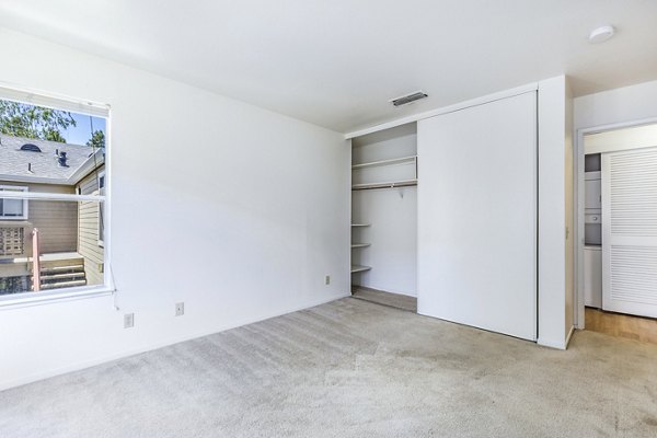 Cozy bedroom with modern decor at Wood Creek Apartments