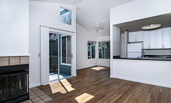 Dining room with modern furnishings at Wood Creek Apartments in a Greystar luxury community