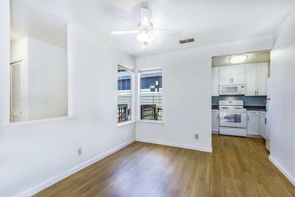 Dining area with modern furnishings at Wood Creek Apartments, a luxury community offering premium amenities and comfort