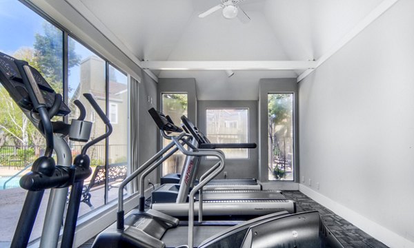 State-of-the-art fitness center with modern equipment at Wood Creek Apartments