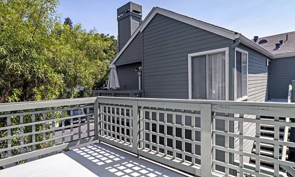 Patio with scenic views at Wood Creek Apartments, a Greystar luxury living community