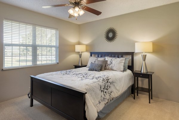 Modern bedroom with stylish decor at Vue at Spring Creek Apartments