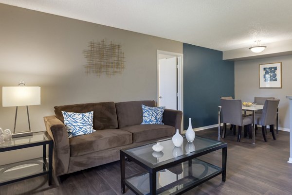 Modern living room with elegant decor in Vue at Spring Creek Apartments, offering luxury living spaces