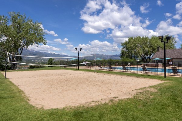 Vue at Spring Creek: Outdoor sport court with basketball hoops and green surroundings for active living