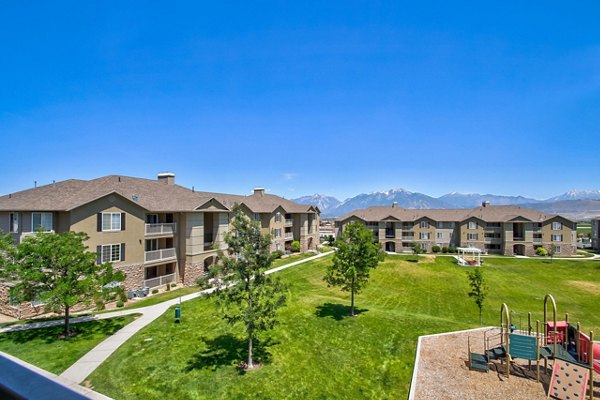 playground area with mountain views at Monarch Meadows Apartments