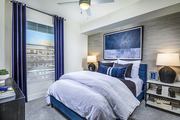 Luxury bedroom with modern decor at The Residences at Cota Vera Apartments