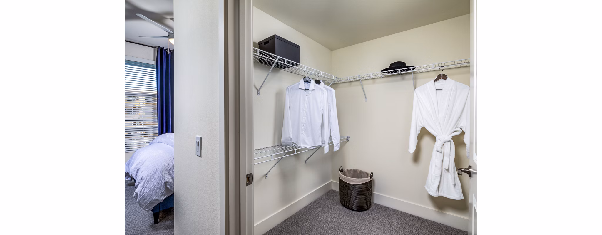 Cozy bedroom with modern furnishings at The Residences at Cota Vera Apartments