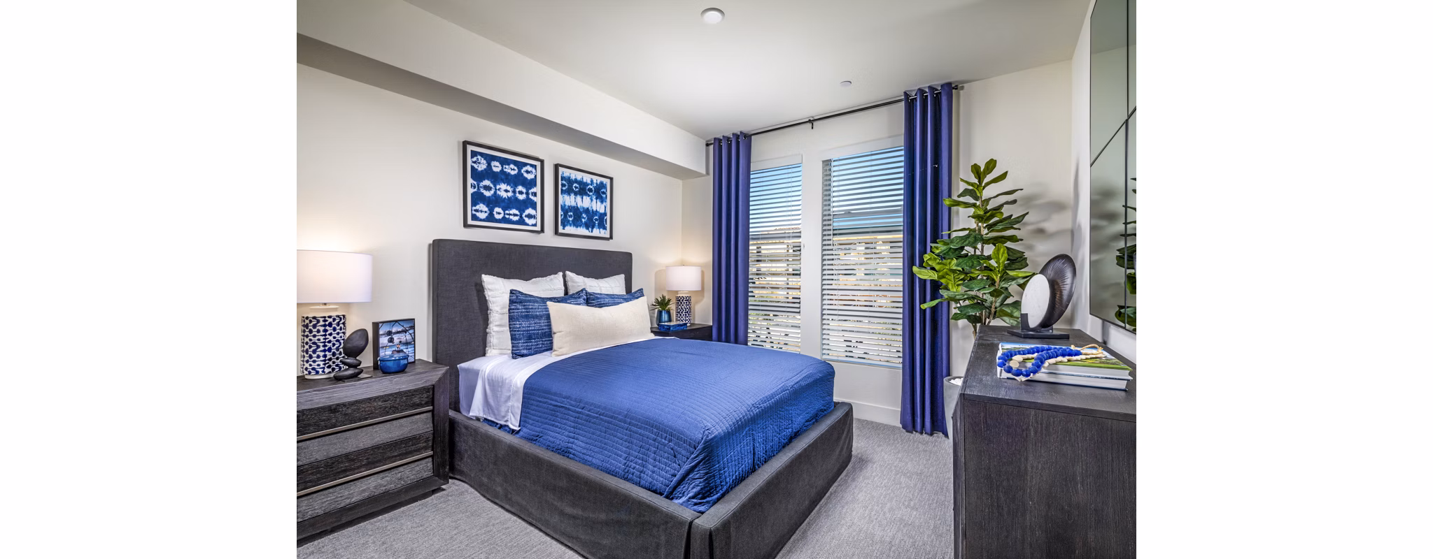 Cozy bedroom with elegant furnishings at The Residences at Cota Vera Apartments, offering luxury living