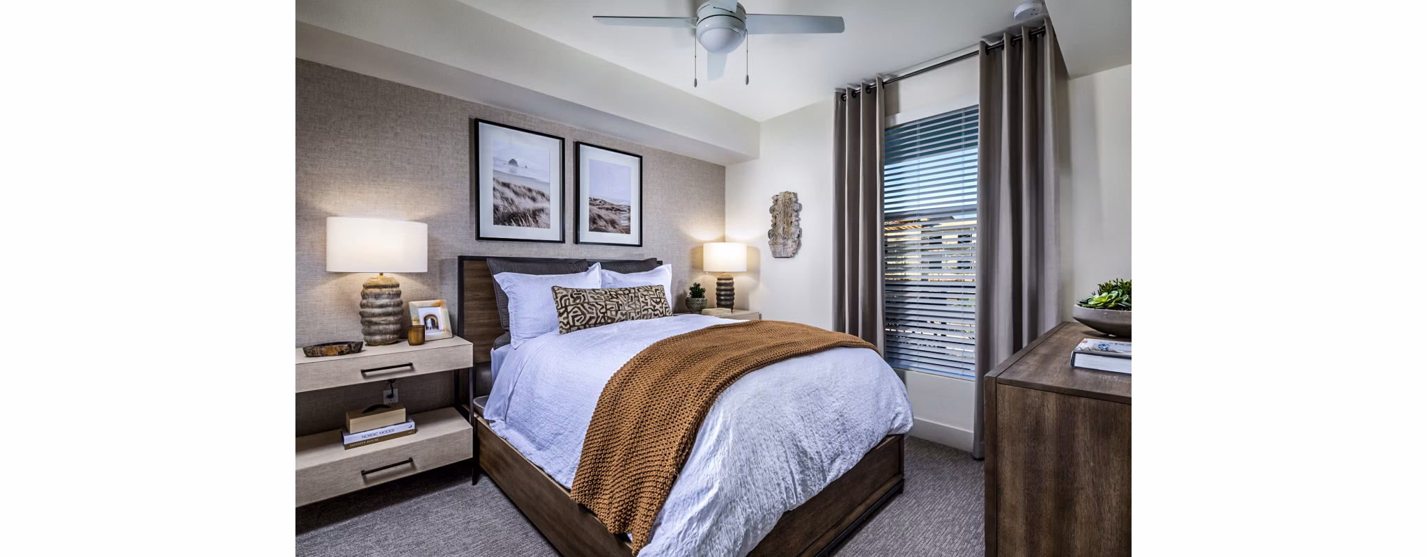Cozy bedroom with modern decor at The Residences at Cota Vera Apartments