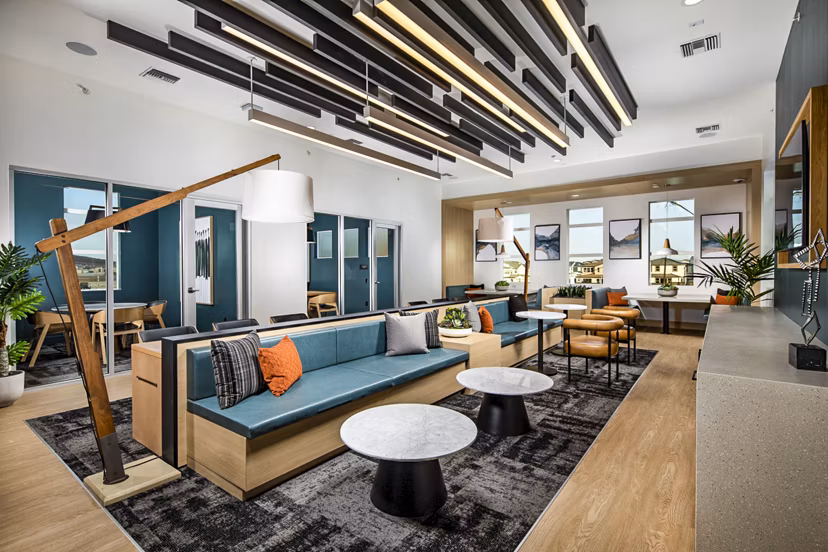 Clubhouse featuring modern design and communal seating at The Residences at Cota Vera Apartments