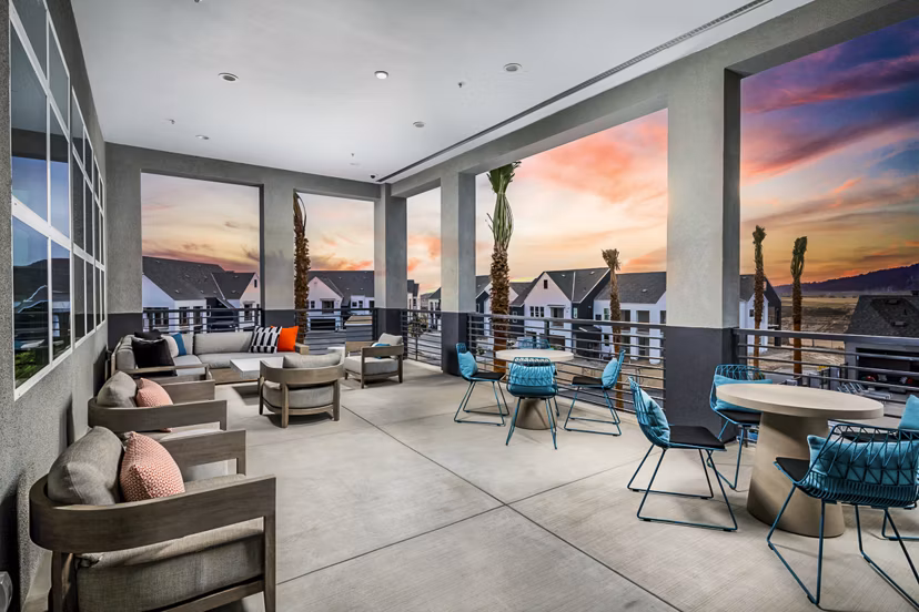 Clubhouse with modern design and seating at The Residences at Cota Vera Apartments