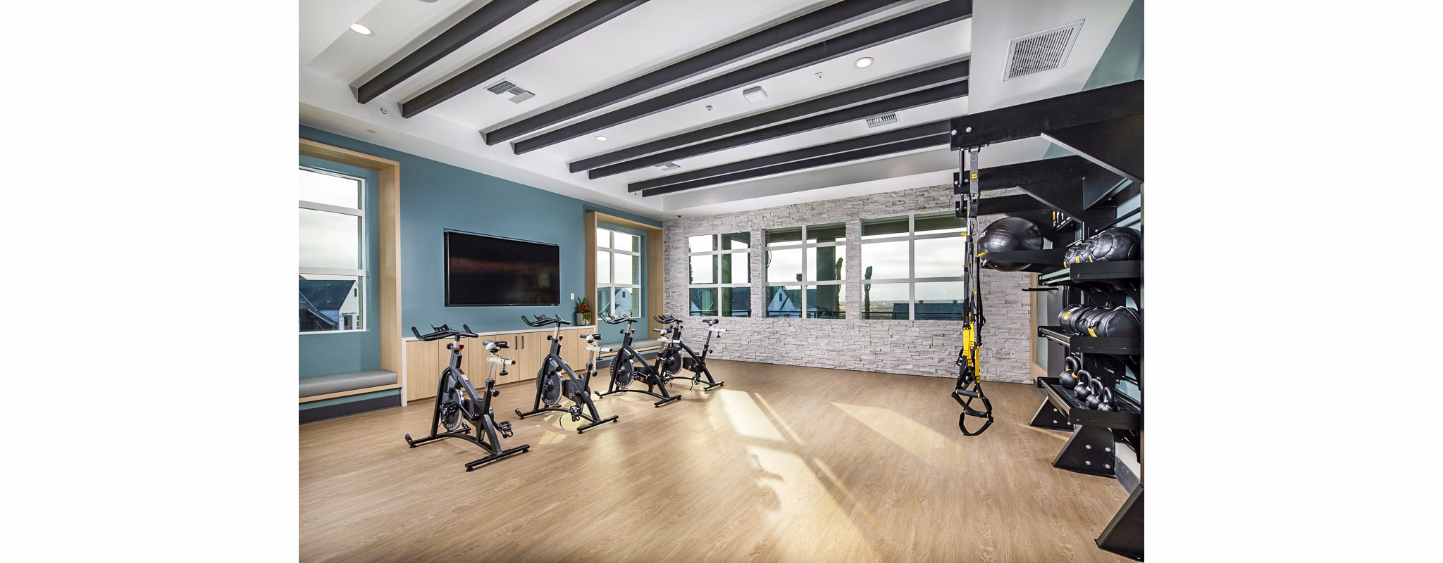 Modern spin studio with state-of-the-art bikes at The Residences at Cota Vera Apartments