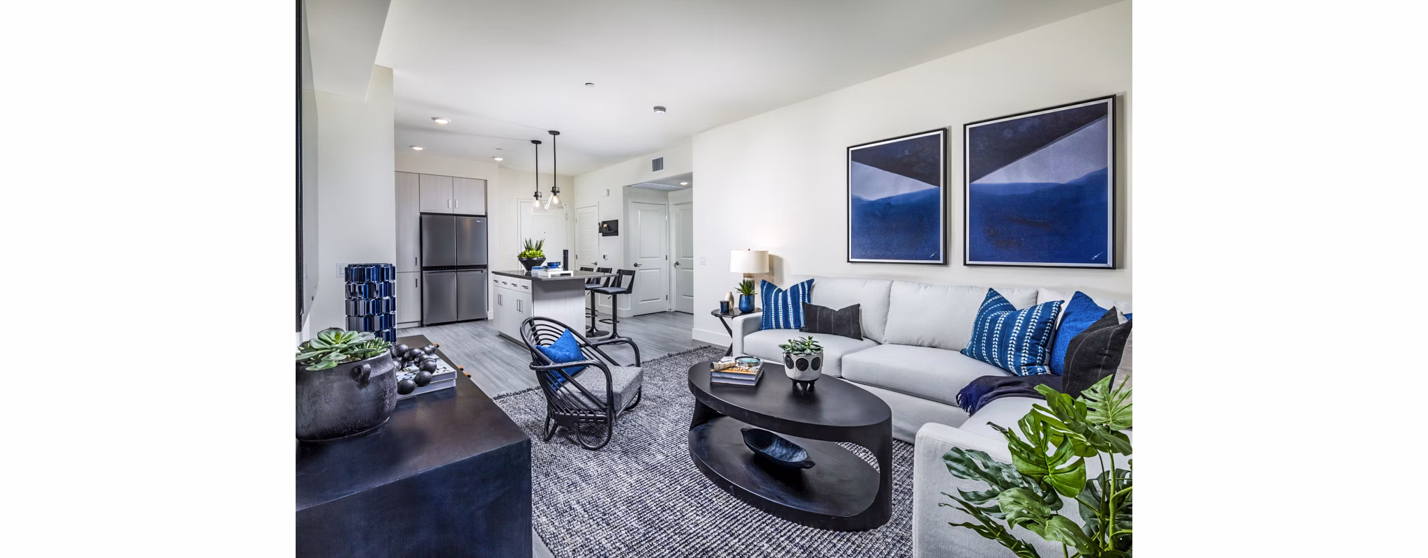 Modern living room with stylish decor at The Residences at Cota Vera Apartments