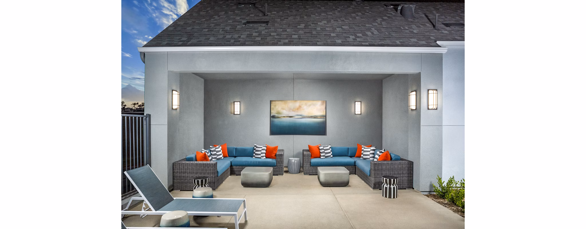 Chic outdoor patio space at The Residences at Cota Vera Apartments, perfect for relaxation and social gatherings