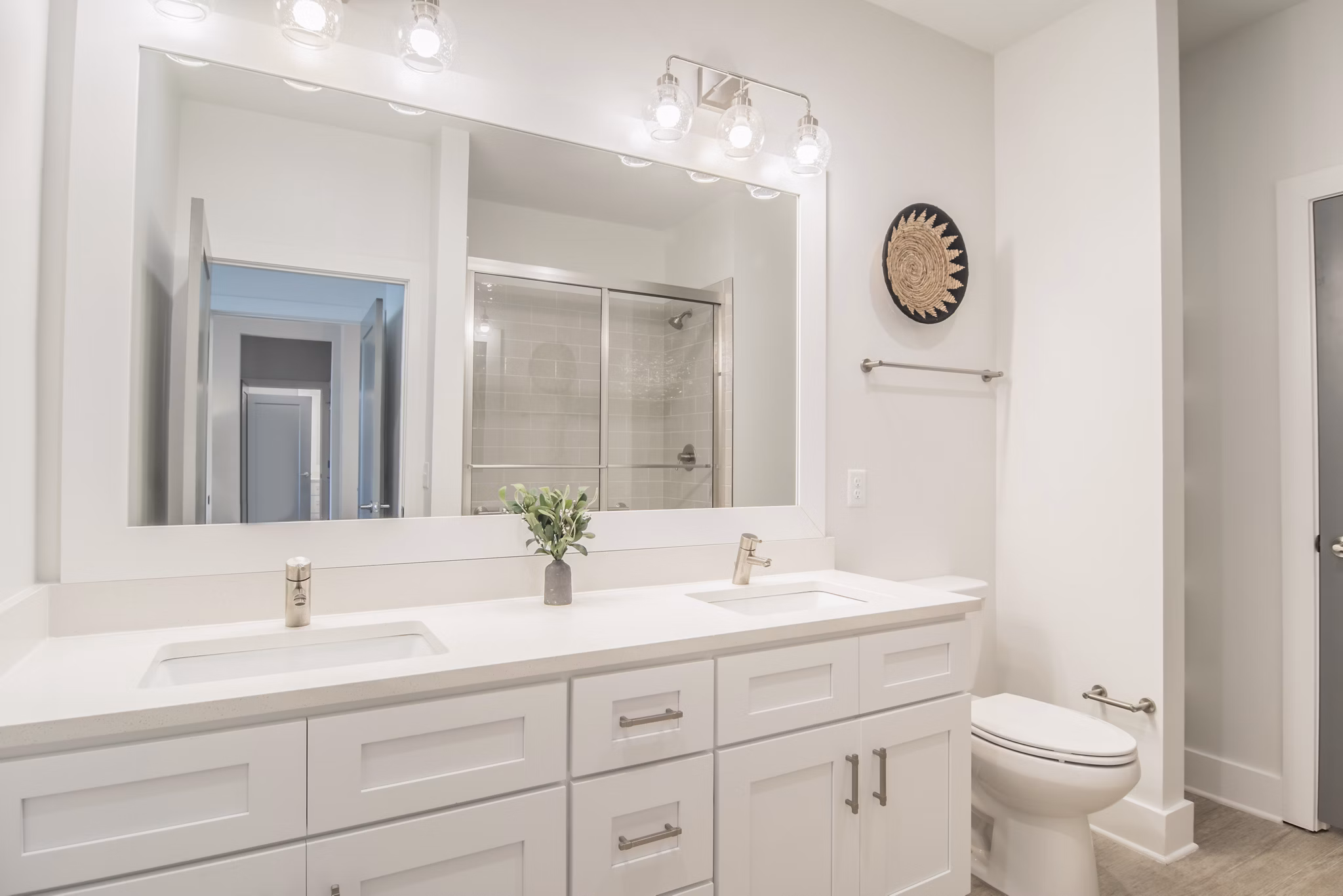Modern bathroom with sleek fixtures at The Heron luxury apartments, River Island