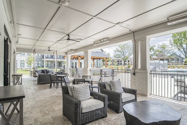 Chic patio with modern seating at The Heron at River Island Apartments, perfect for outdoor relaxation and entertaining in a luxury setting